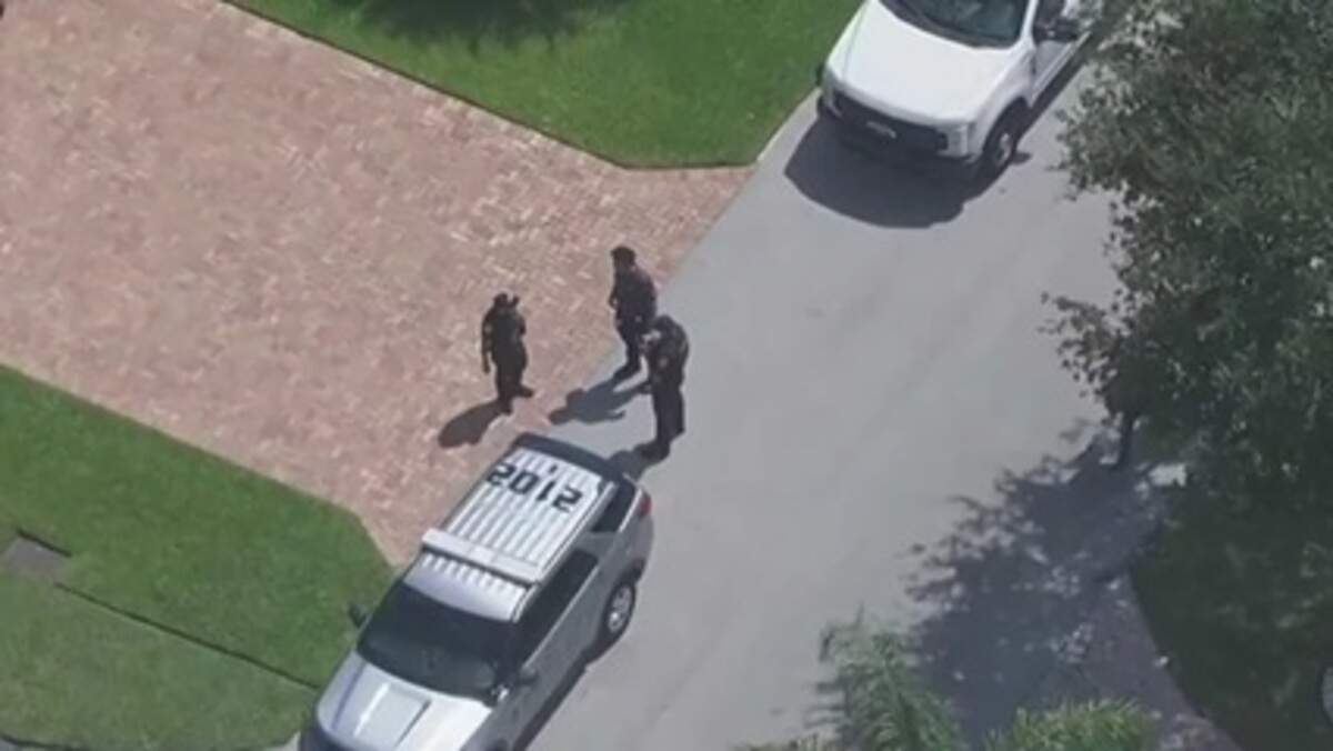 Police investigate after an attacking dog was killed in Lighthouse Point on Aug. 6, 2026. Police investigate after an attacking dog was killed in Lighthouse Point on Aug. 6, 2026.